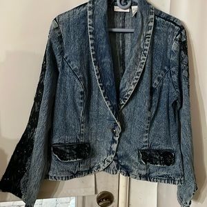 Jeanology Collection ladies jeans jacket with black lace on the sleeves.